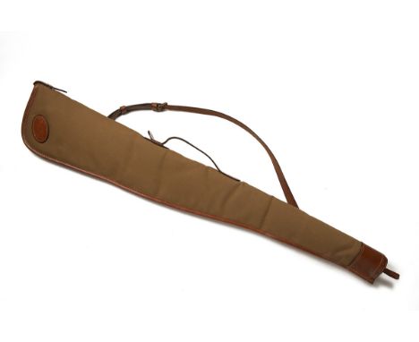 W.R. &amp; CO. LTD. A FLEECE-LINED SAND AND MID-TAN CANVAS AND LEATHER SINGLE GUNSLIP, approx. 44 1/2in. external length, bro
