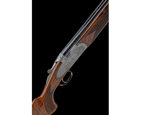 A 12-BORE 'MOD. S687 EELL' SINGLE-TRIGGER SIDEPLATED OVER AND UNDER EJECTOR, serial no. N98380B, for 2002, 29 1/2in. nitro ba