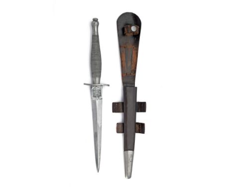 WILKINSON SWORD CO. LTD., LONDON A RARE MKI FAIRBAIRN-SYKES DAGGER 1941/42, with standard form double-edged 6 3/4in. blade re