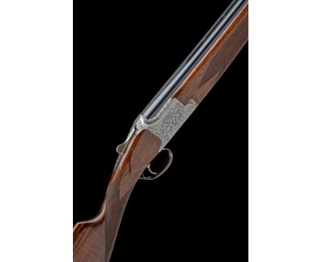 FABRIQUE NATIONALE A 12-BORE 'B2F' SINGLE-TRIGGER OVER AND UNDER EJECTOR, serial no. 863PM01378, for 1980, 27 1/2in. nitro ba