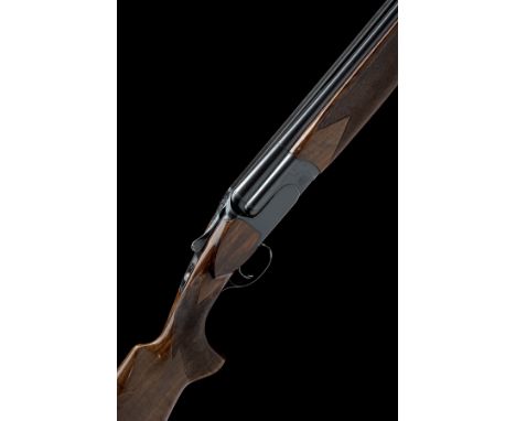 PERAZZI A 12-BORE 'MX12' SINGLE-TRIGGER TRIGGERPLATE ACTION OVER AND UNDER EJECTOR, serial no. 76957, for 1989, 27in. nitro b