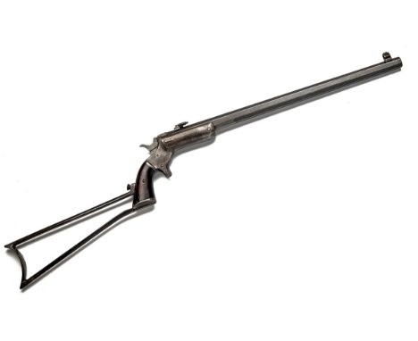 A .32 (RIMFIRE) J. STEVENS TAKE-DOWN POCKET RIFLE, SECOND ISSUE, serial no. 3261, circa 1885, with octagonal 18in. barrel, tu