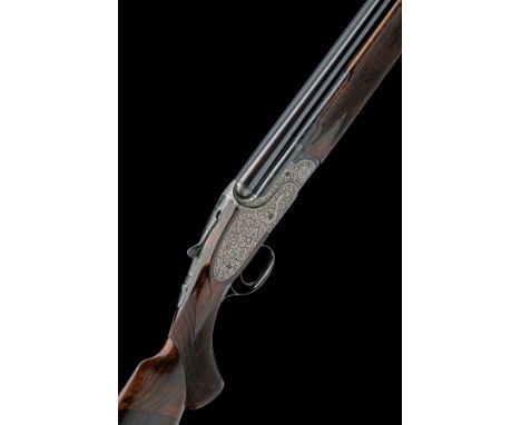 HOLLOWAY &amp; NAUGHTON A WISEMAN-ENGRAVED 20-BORE SINGLE-TRIGGER OVER AND UNDER SIDELOCK EJECTOR, serial no. HN023, for 2001