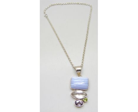 A large silver pendant and chain, set with agate, amethyst, rock crystal and peridot
