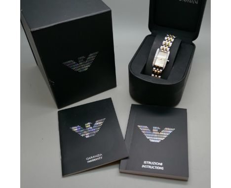An Emporio Armani ladies wristwatch, set with 32 diamonds, boxed with papers
