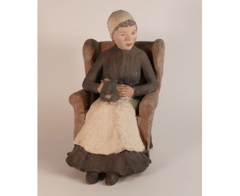Isabella Pope, Studio Pottery figure of a seated maid with cat. Pope was a Master Potter and teacher who created forms inspir