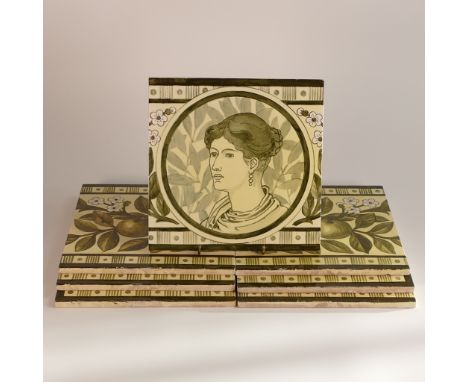 Doulton Lambeth, Arts &amp; Crafts period set of seven monochromatic green earthenware wall tiles. Central circular reserve w