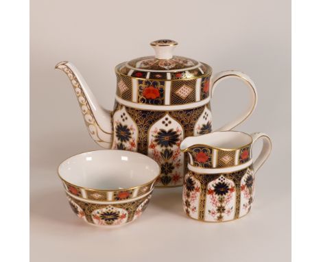 Royal Crown Derby Imari 1128 pattern tea pot, open sugar bowl &amp; milk jug, height of teapot 20cm (3).