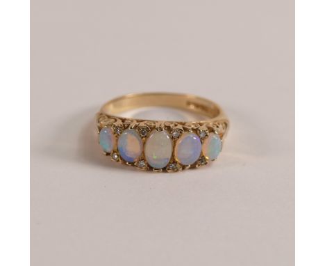 9ct gold ring set with five opals, size N, 4g.