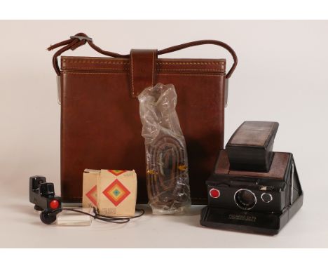 Polaroid SX-70 Land Camera Model 2 in original leather fitted case with accessories and ephemera.