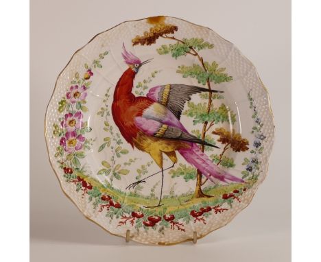 Early 19th century Porcelain hand painted plate, painted with central exotic bird in naturalistic setting. Gilt Crown over BB