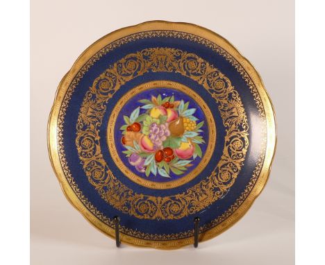 Mintons, fruit still life lustre cabinet plate. Blue ground with heavily gilt decoration and rim. Diameter: 22cm