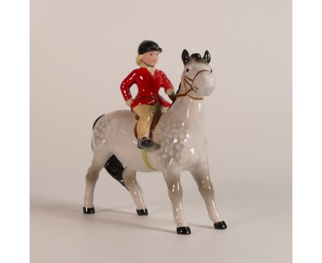 Beswick Girl on grey pony, model 1499, this item decorated off the factory at later date from production.