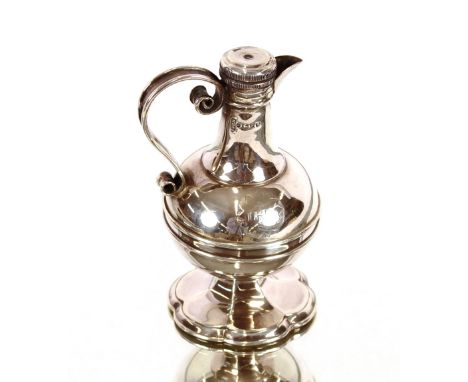 A Victorian silver travelling communion water jug, of baluster shape, Sheffield 1882, maker Walker &amp; Hall, 11cm high