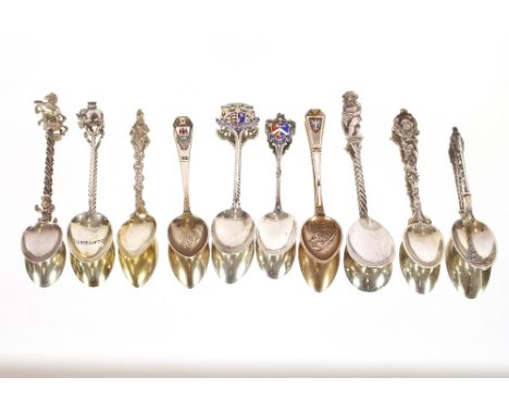 Ten silver and enamel topped spoons, decorated horses, elephants etc.