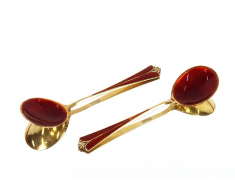 A pair of Continental .925 mark red enamel spoons, in box
