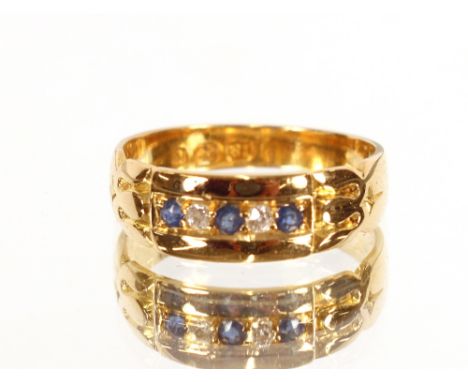 An 18 carat gold sapphire and diamond ring, dated 1916, size M