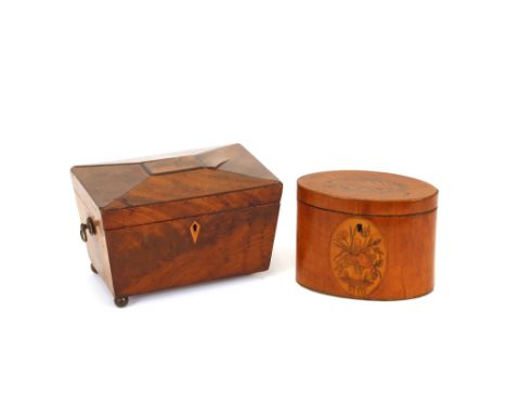 A 19th Century mahogany and satinwood inlaid elliptical tea caddy, the lid with conch shell paterae and oval inlaid panel aro