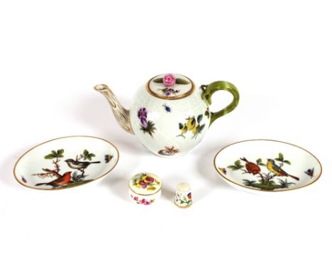 A Herend porcelain bullet shaped teapot; two Herend oval pin dishes with bird and floral decoration; a miniature Royal Worces