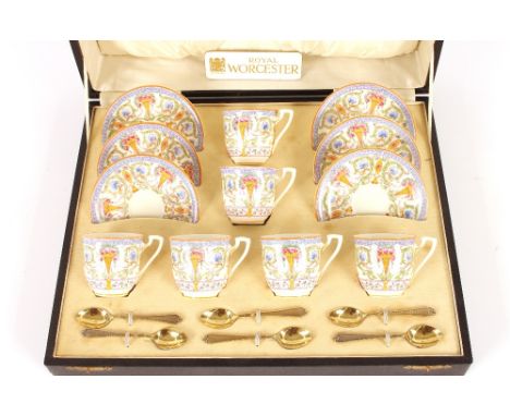 A Royal Worcester tea set, contained in original silk lined box with six silver gilt spoons, circa 1930s