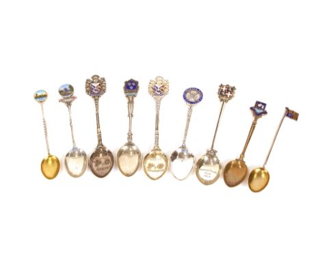 Nine silver hallmarked and enamel topped souvenir spoons