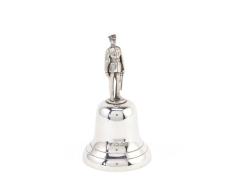 A novelty silver bellGoldsmiths &amp; Silversmiths Company, London 1958 The handle modelled as an army officer, height 13.5cm