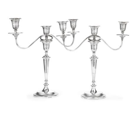 A pair of silver three-light candelabraTessiers, London 1935 / 1938 Neo-Classical form, the detachable branch sections with r