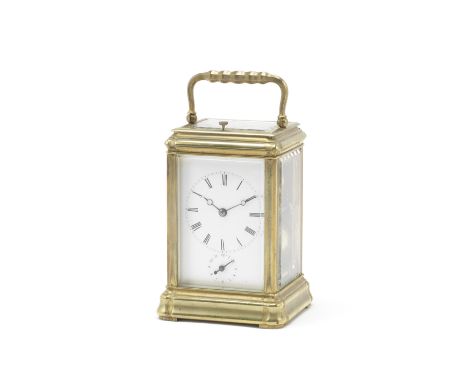 A late 19th/early 20th century brass carriage clock with alarm and repeatthe gorge case with scrolling canted knopped swing h