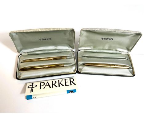 A boxed Parker fountain pen and ballpoint; a boxed Parker set containing ballpoint only.