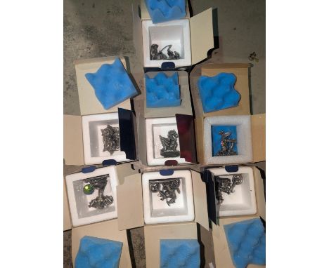 A collection of Tudor Mint Myth and Magic pewter figures with boxes.
