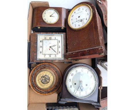 A Smith's Enfield Bakelite cased mantel clock, a Eustance and Co. Harrington mantel clock, two others and an aneroid baromete