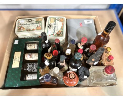 A variety of miniatures, some in presentation boxes/tins, to include cognac, whiskies, liqueurs, sherry, vodka, wine etc; a l