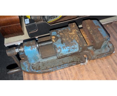A large heavy bench vice.