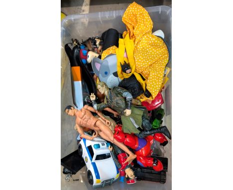A collection of action figures including Action Man, Captain Scarlet etc.