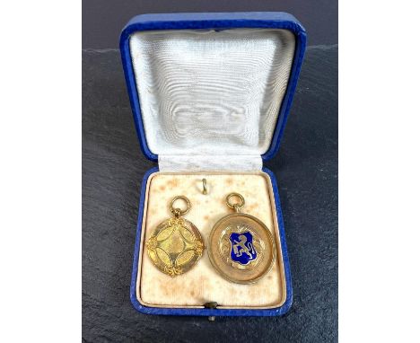 Two 9ct gold sports medals, one with enamel shield, 10.5gms.