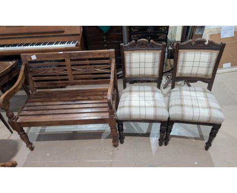 A small 2 seater stained wood garden bench; a pair of Edwardian dining chairs in fawn check.