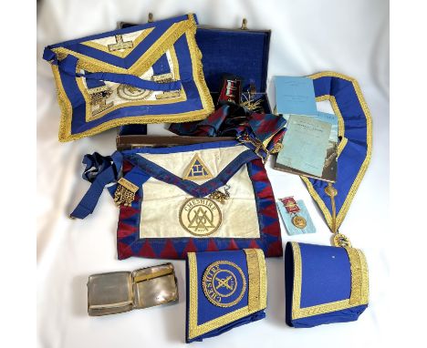 A hallmarked silver cigarette case with scrolling detail, an album of coins and Masonic items.