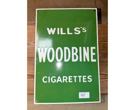 A Will's Woodbine Cigarettes enamel green sign.