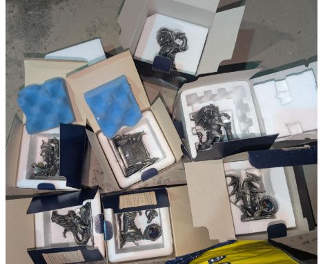 A collection of Tudor Mint Myth and Magic pewter figures with boxes.