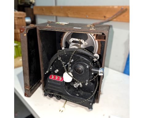 A vintage Pathescope 'Son' projector in case.