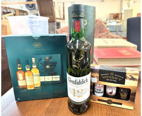 A bottle of Glenfiddich single malt Scotch Whisky, in box; a gift set of 3 x 20cl classic single malt whiskies - Talisker, La