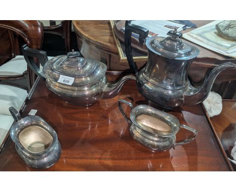 A silver-plated four-piece tea service.