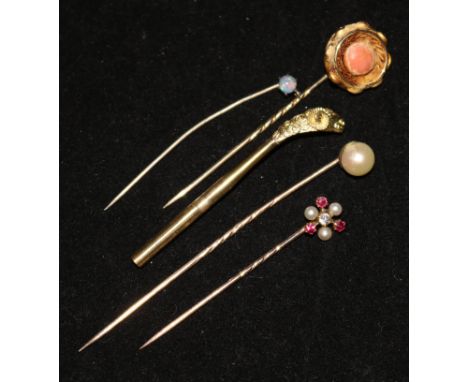 Four gem set tie pins and dog hat pin top.