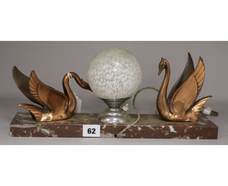 A figural Art Deco lamp