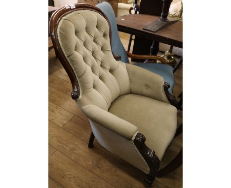A Victorian mahogany button back armchair
