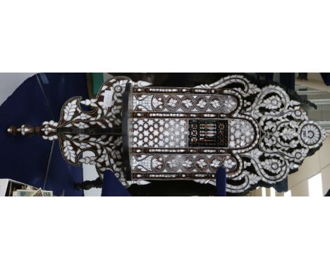 A Syrian hardwood and mother of pearl inlaid bracket