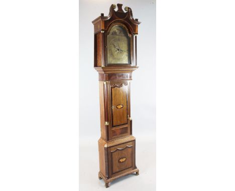 An early 19th century mahogany banded oak eight day longcase clock, the arched brass dial with subsidiary seconds and date ap