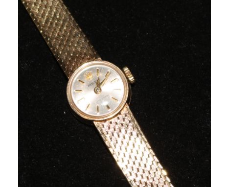A lady's 9ct gold Rolex Precision manual wind wrist watch on a 9ct gold Rolex bracelet, in Rolex box.