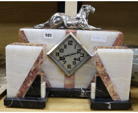 An Art Deco panther clock set