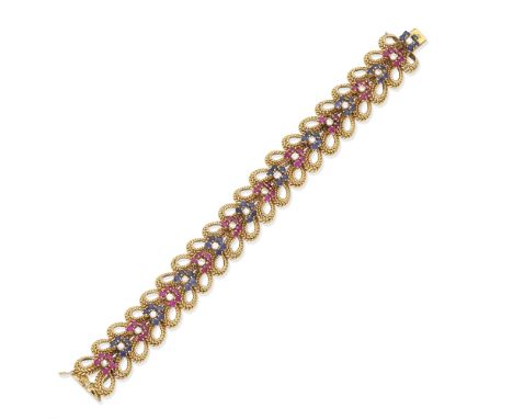 RUBY, SAPPHIRE AND DIAMOND BRACELET, MID 20TH CENTURYOf openwork ropetwist linking, set with brilliant-cut diamond, ruby and 